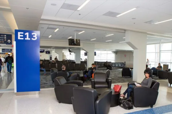 Recessed linear lighting in airport boarding area